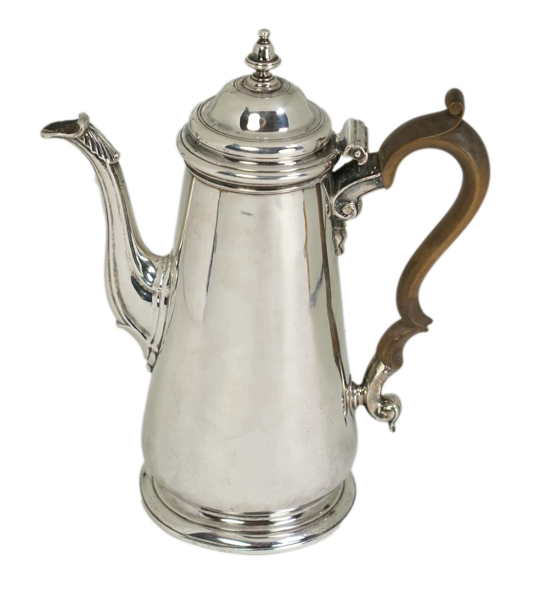 A mid 18th century silver coffee pot, marks very rubbed